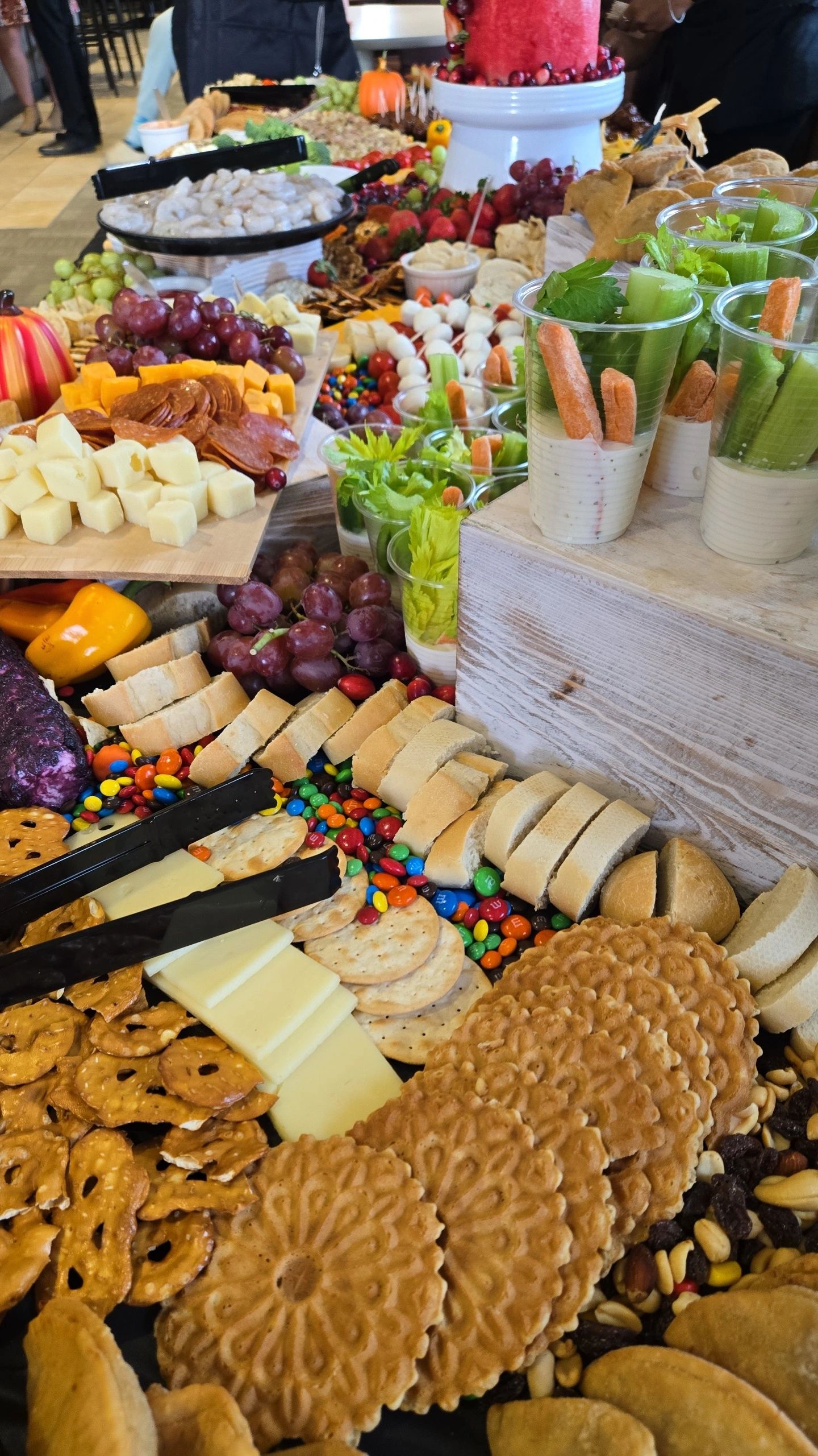 Catering spread with appetizers and charcuterie